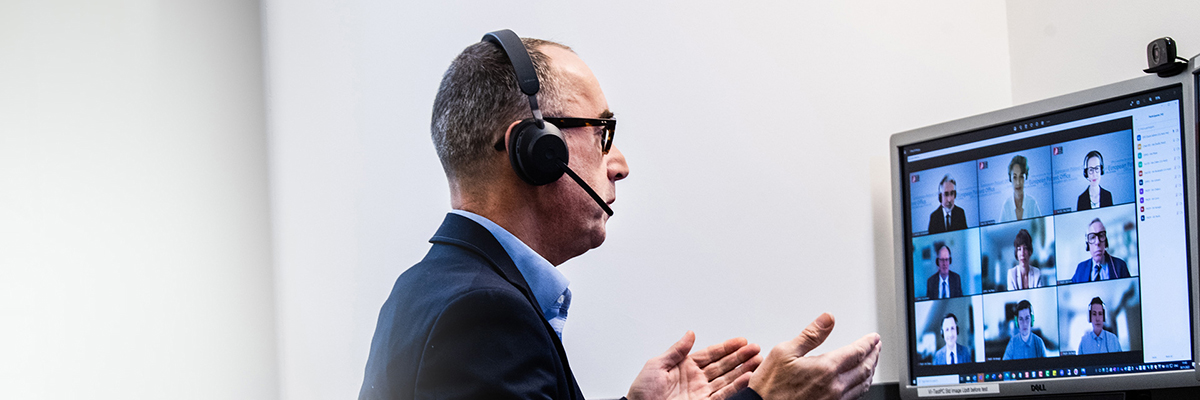 Man in a videoconference